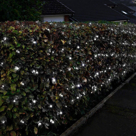 NOMA cool white net lights on a hedge