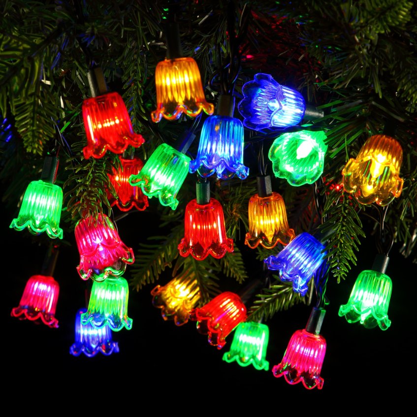 Up close shot of NOMA multicolour Canterbury belles shades hanging on a Christmas tree