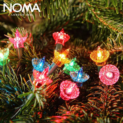 close up shot of NOMA multicolour pickwick LED lights on a Christmas tree