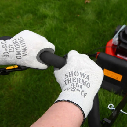 Showa 451 thermal gloves in use for gardening