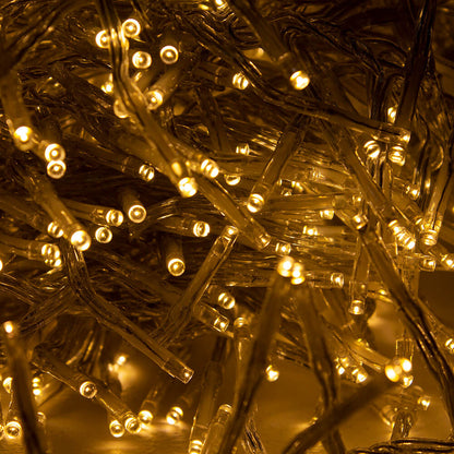 Close up image of warm white cluster lights with clear cable